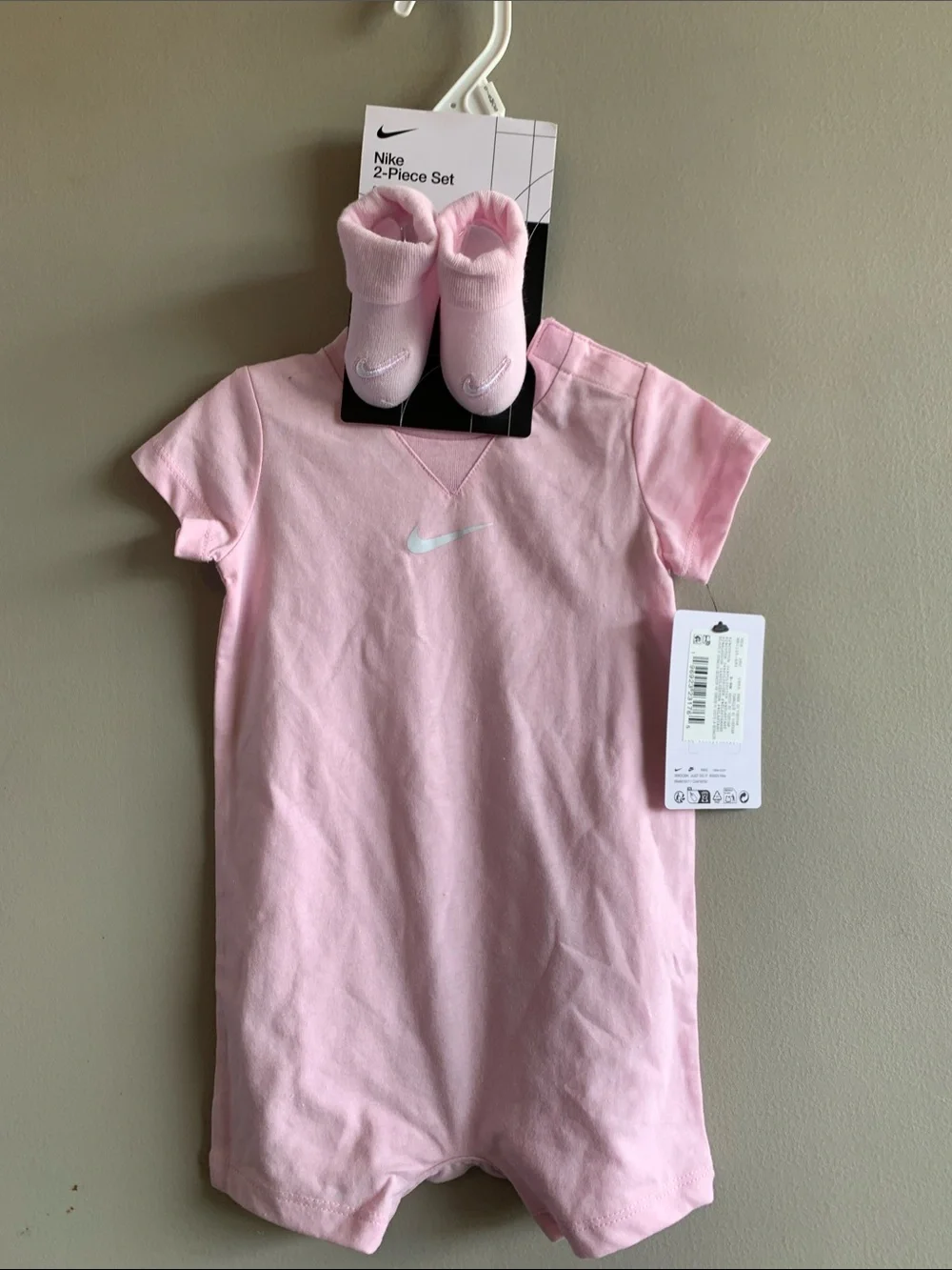 Nike Pink Short-Sleeve Baby Romper with Matching Socks